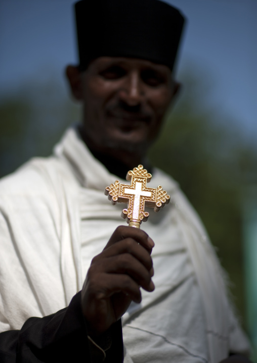 Priest showing a  cross, Ethiopia