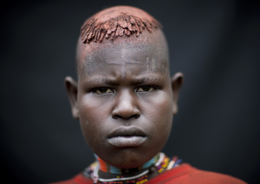 Menit woman with a cross shaped scar on the forehead, Tum market, Omo valley, Ethiopia