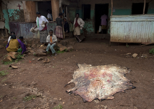 Animal skin drying in front of a restaurant in tum market, Omo valley, Ethiopia