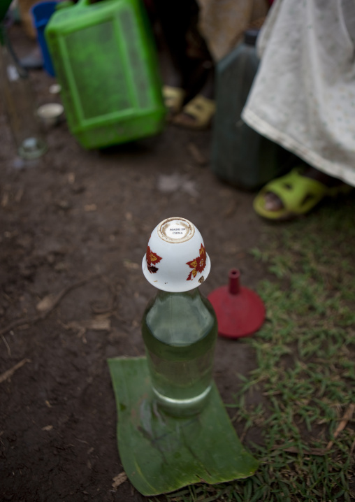 Alcohol bottle with made in china, Tum market, Omo valley, Ethiopia