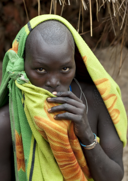 Surma Woman Hidding Her Lip Plate, Turgit Village, Omo Valley, Ethiopia
