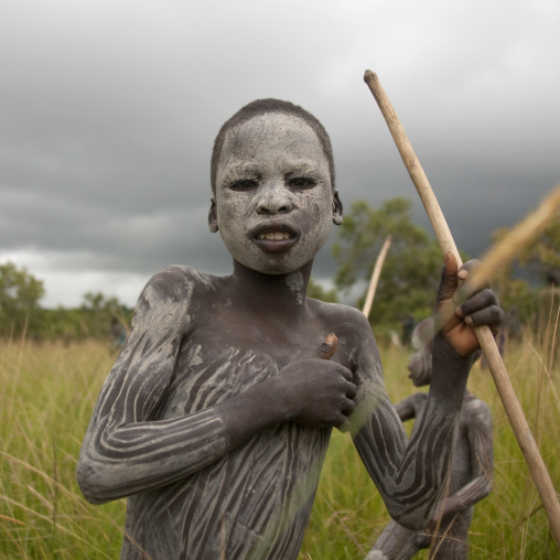 Suri Boy Imitating The Adult Warriors, Omo Valley, Ethiopia
