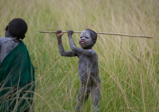 Suri Boys Imitating The Adult Warriors, Omo Valley, Ethiopia