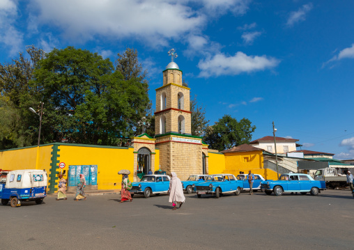 Peugeot 404 taxis in Medhane Alem cathedral, Harari region, Harar, Ethiopia