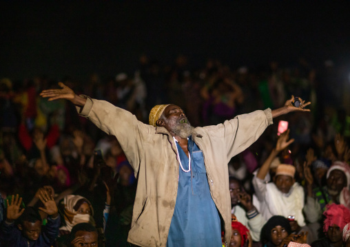 Oromo pilgrims praying in the night in Sheikh Hussein shrine, Oromia, Sheik Hussein, Ethiopia