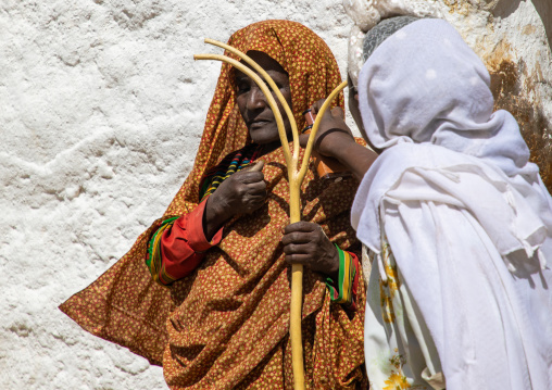 Woman putting perfume on an oromo pilgrim in Sheikh Hussein shrine, Oromia, Sheik Hussein, Ethiopia