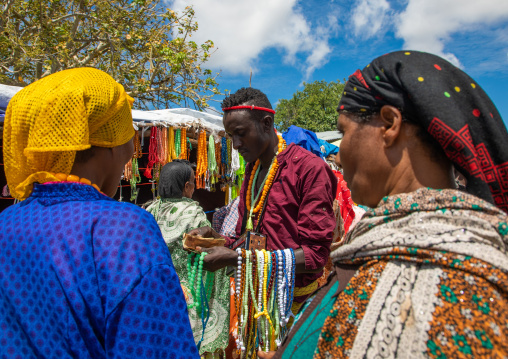 Oromo pilgrims buying necklaces and prayer beads, Oromia, Sheik Hussein, Ethiopia