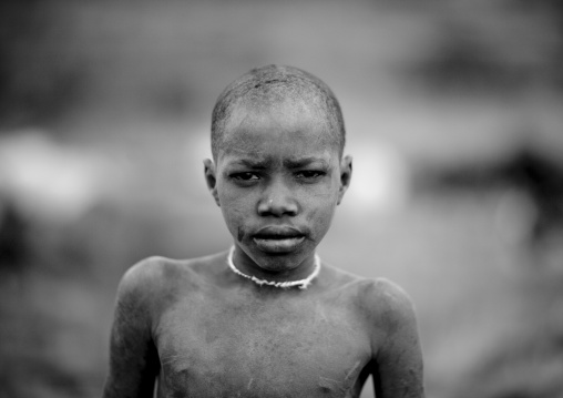 Surma boy, Turgit village, Omo valley, Ethiopia