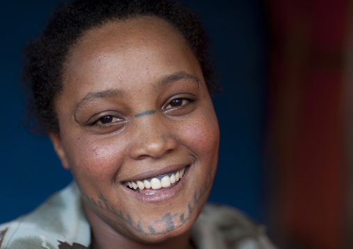 Woman with tattoos on the face, Ethiopia