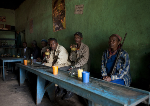 People drinking tej in a pub, Ethiopia