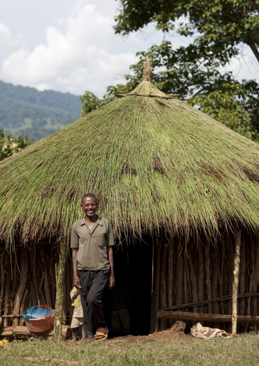 Man Smiling In Front Of His Hut, Ethiopia