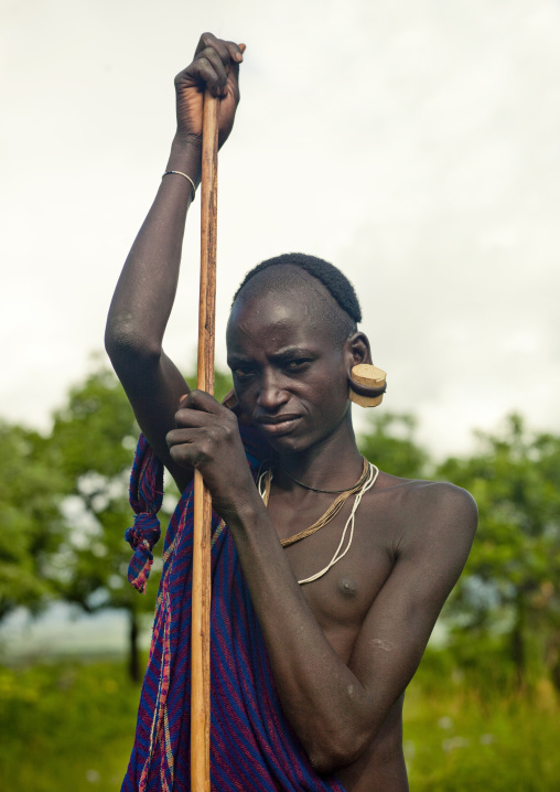 Surma Man With A Stick, Turgit Village, Omo Valley, Ethiopia