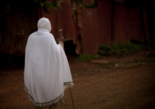 Veiled woman holding a stick, Mezan teferi area, Ethiopia
