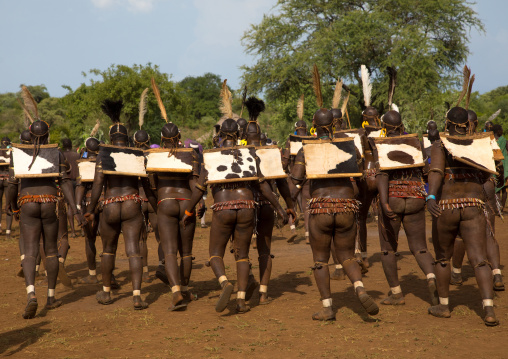 Bodi tribe fat men during Kael ceremony, Omo valley, Hana Mursi, Ethiopia