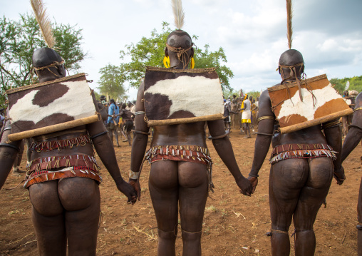 Bodi tribe fat men during Kael ceremony, Omo valley, Hana Mursi, Ethiopia