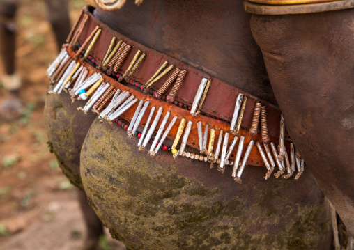 Bodi tribe fat man with cow dungs on his butt during Kael ceremony, Omo valley, Hana Mursi, Ethiopia
