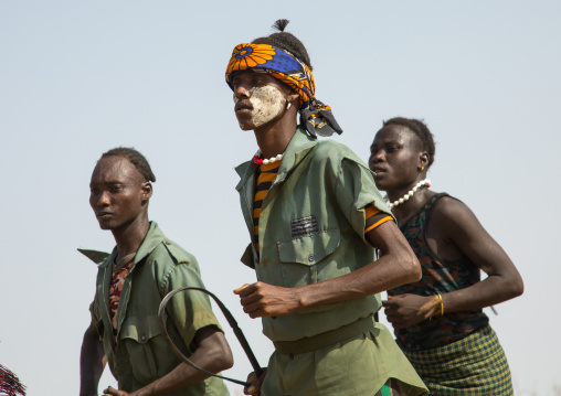 Men with weapons during the proud ox ceremony in the Dassanech tribe, Turkana County, Omorate, Ethiopia