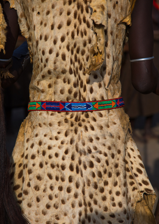 Dassanech man with leopard skin during Dimi ceremony to celebrate circumcision of teenagers, Turkana County, Omorate, Ethiopia