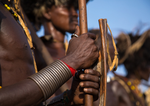 Man holding a shield during the Dimi ceremony in Dassanech tribe to celebrate circumcision of teenagers, Turkana County, Omorate, Ethiopia