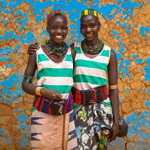 Hamer tribe young women smiling, Omo valley, Dimeka, Ethiopia