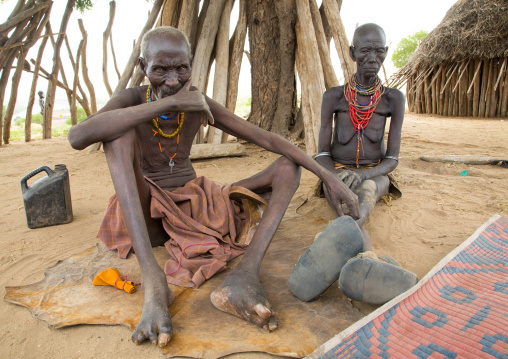 Podo and moko from Karo tribe who had to kill ten mingis children they had before their wedding, Omo valley, Korcho, Ethiopia