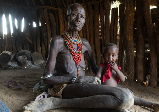 Mrs Moko who had to kill ten children she had before her wedding and who were mingis, Omo valley, Korcho, Ethiopia