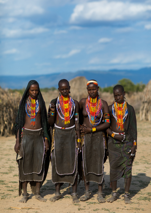 Portrait of Erbore tribe women with black veils and colourful necklaces, Omo valley, Murale, Ethiopia
