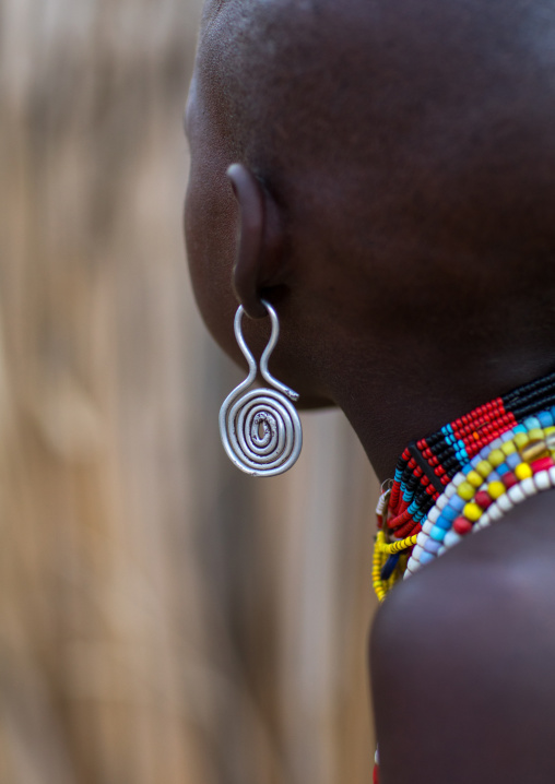 Erbore tribe girl with earrings, Omo valley, Murale, Ethiopia