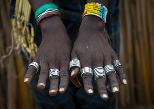 Hands with rings of an Erbore tribe woman, Omo valley, Murale, Ethiopia