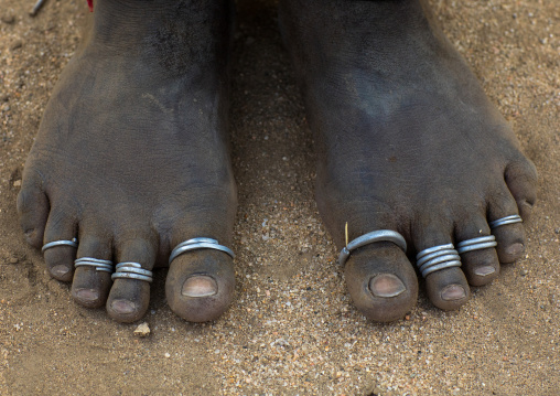Feet with rings of an Erbore tribe woman, Omo valley, Murale, Ethiopia