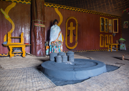 Gurage woman in front of the fireplace inside her traditional house, Gurage Zone, Butajira, Ethiopia