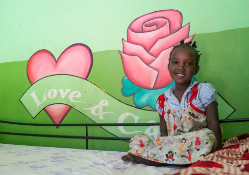 Mingi girl in her bedroom in Omo child foundation, Omo valley, Jinka, Ethiopia