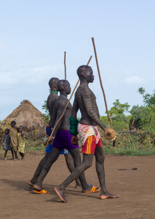 Young men during the fat men ceremony in Bodi tribe, Omo valley, Hana Mursi, Ethiopia