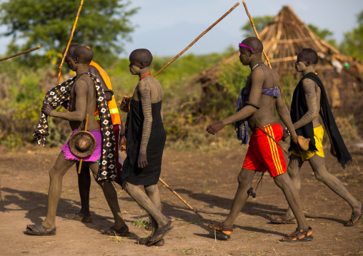Young men during the fat men ceremony in Bodi tribe, Omo valley, Hana Mursi, Ethiopia