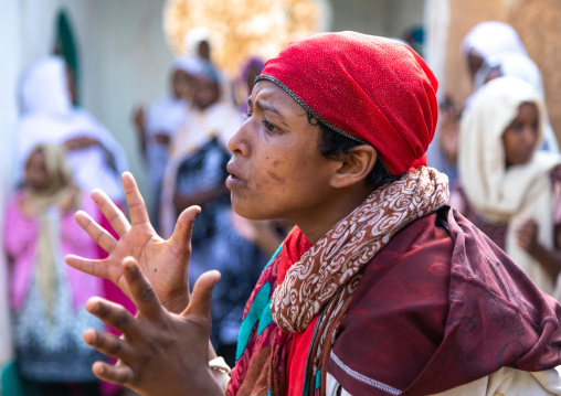 Harari woman goes into a trance during a muslim ceremony, Harari Region, Harar, Ethiopia