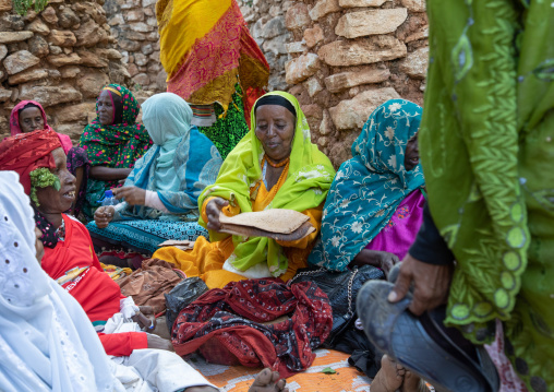 Harari women preparing injera for a muslim celebration, Harari Region, Harar, Ethiopia
