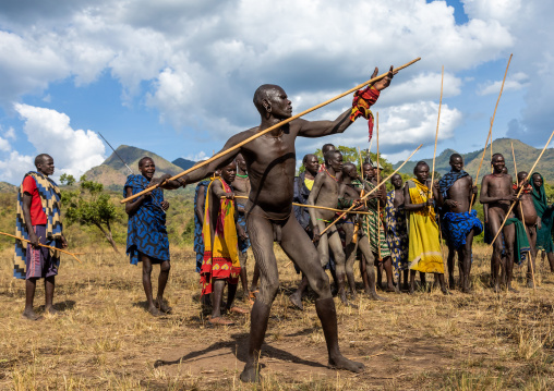 Suri tribe warriors during a donga stick fighting ritual, Omo valley, Kibish, Ethiopia