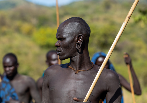 Suri tribe warrior during a donga stick fighting ritual, Omo valley, Kibish, Ethiopia