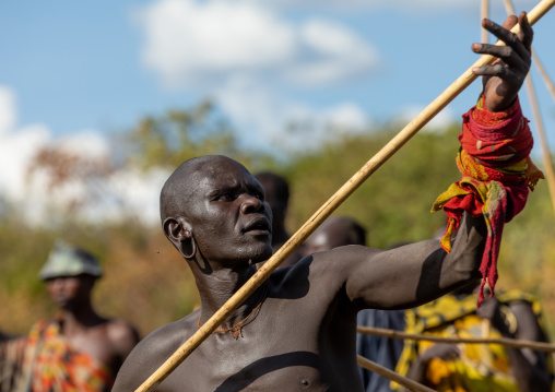 Suri tribe warrior during a donga stick fighting ritual, Omo valley, Kibish, Ethiopia