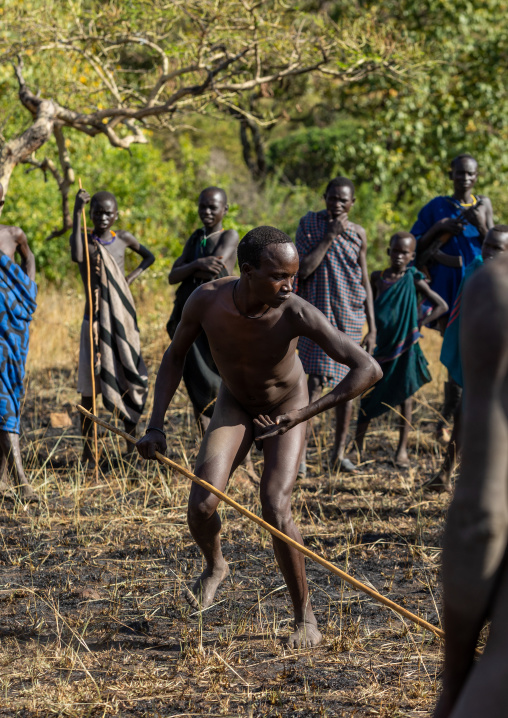 Suri tribe warriors during a donga stick fighting ritual, Omo valley, Kibish, Ethiopia