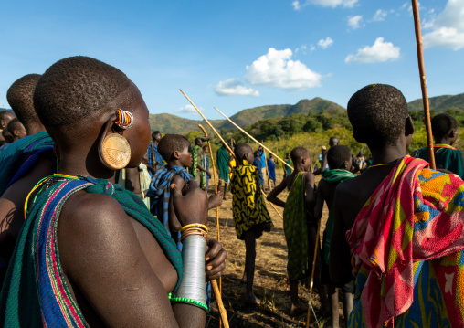 Suri tribe warriors fighting during a donga stick ritual, Omo valley, Kibish, Ethiopia