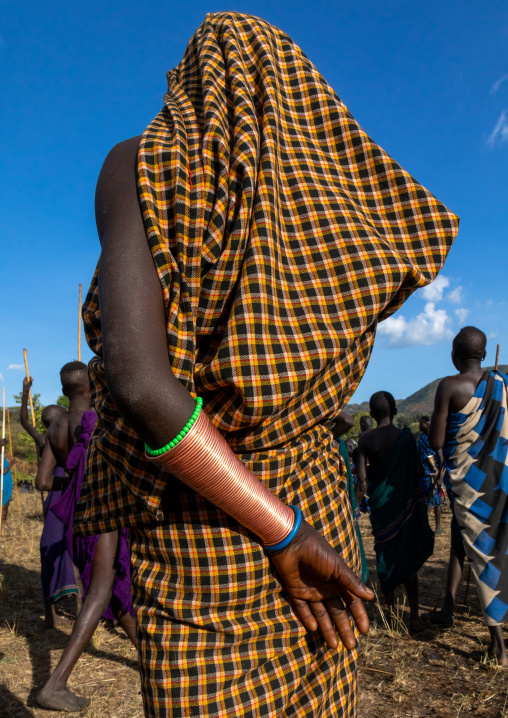 Rear view of a suri tribe woman during a donga ritual, Omo valley, Kibish, Ethiopia