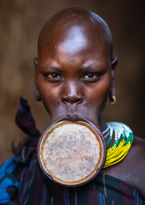 Portrait of a suri tribe woman wearing a lip plate, Omo valley, Kibish, Ethiopia