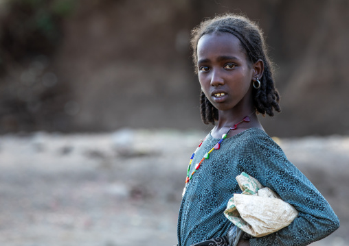 Portrait of an oromo girl, Amhara region, Senbete, Ethiopia