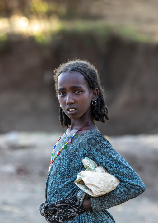 Portrait of an oromo girl, Amhara region, Senbete, Ethiopia
