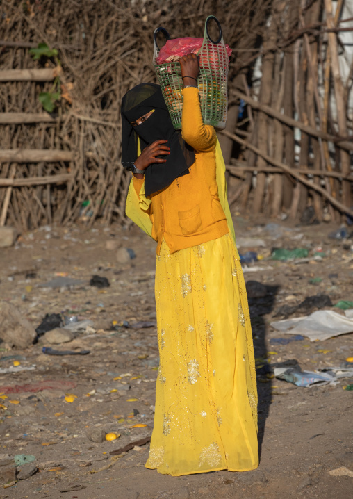 Oromo woman wearing a burqa in the market, Amhara region, Senbete, Ethiopia