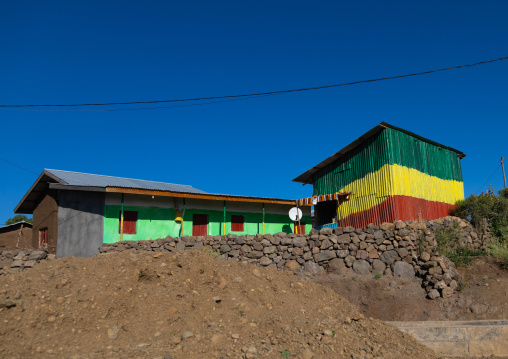 House painted with the ethiopian flag colors, Amhara Region, Lalibela, Ethiopia