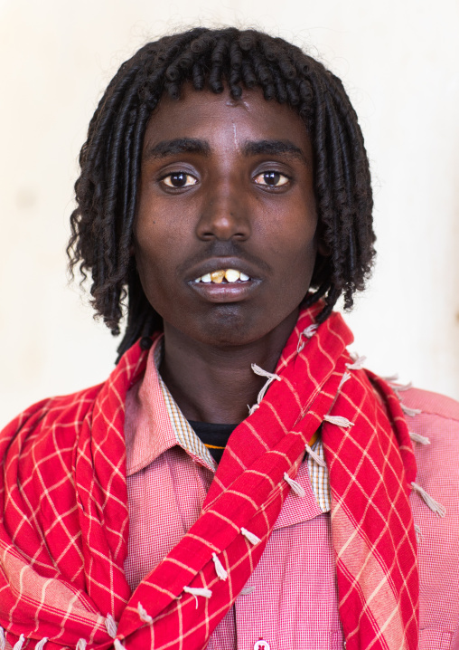 Portrait of an afar tribe man with sharpened teeth, Afar Region, Afambo, Ethiopia