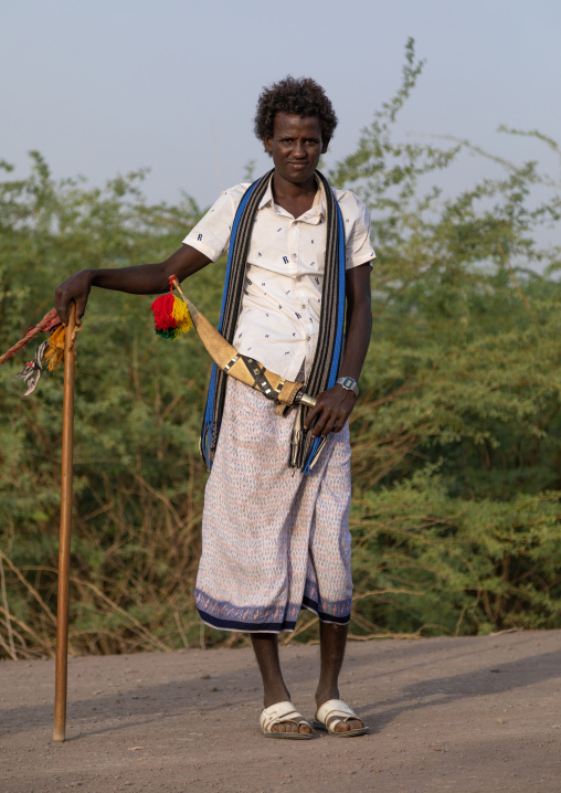 Portrait of an afar tribe man with his traditional knife, Afar Region, Afambo, Ethiopia