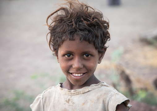 Portrait of a smiling afar tribe girl, Afar Region, Afambo, Ethiopia
